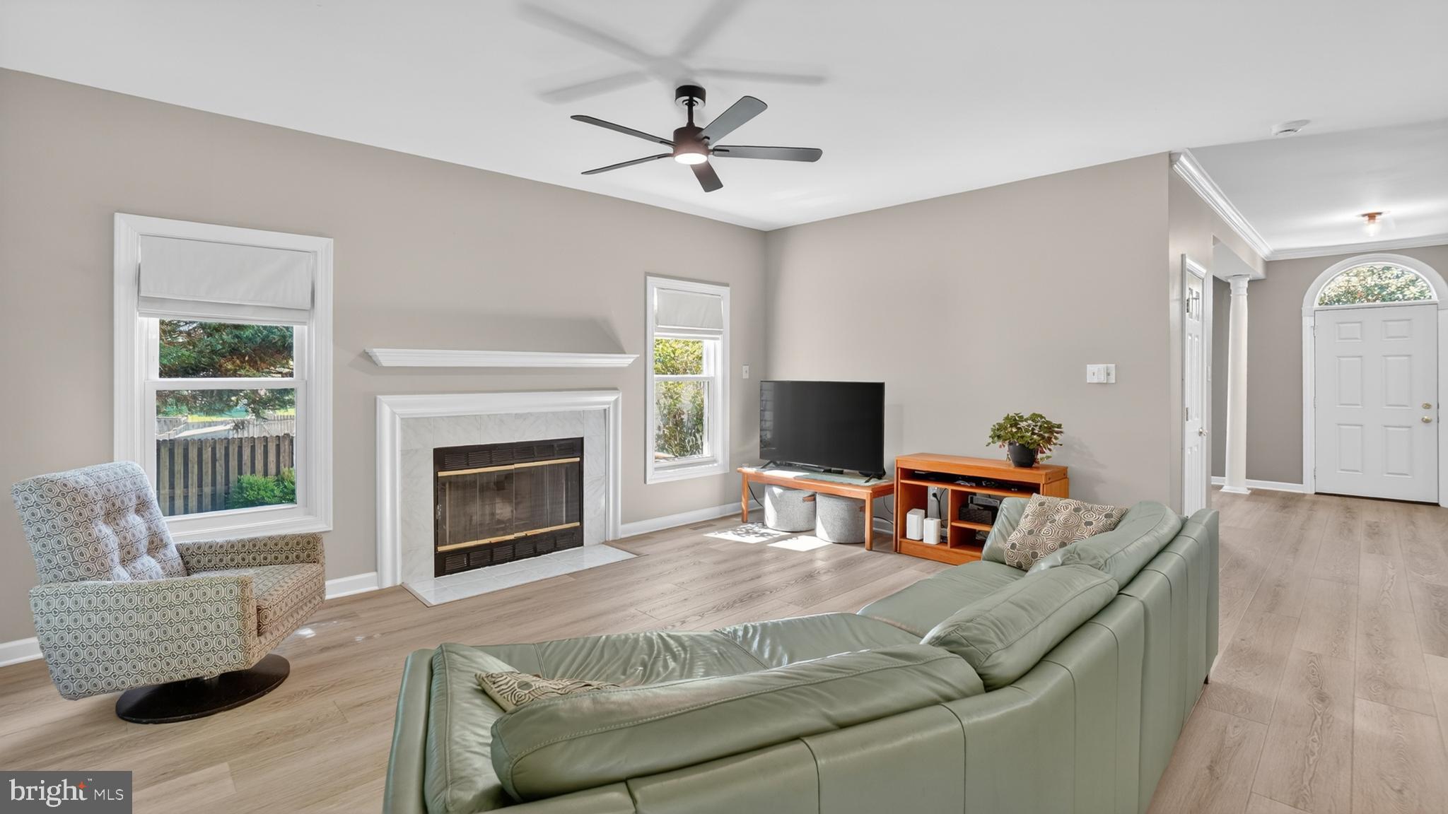 2812 Brite Court Crofton, MD 21114 - Photo 12 of 55 a living room with furniture and a fireplace