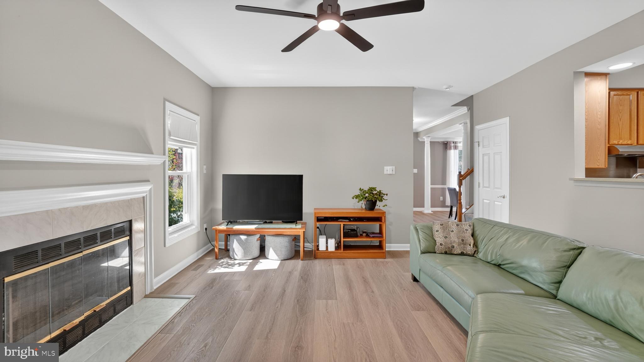 2812 Brite Court Crofton, MD 21114 - Photo 13 of 55 a living room with furniture and a fireplace