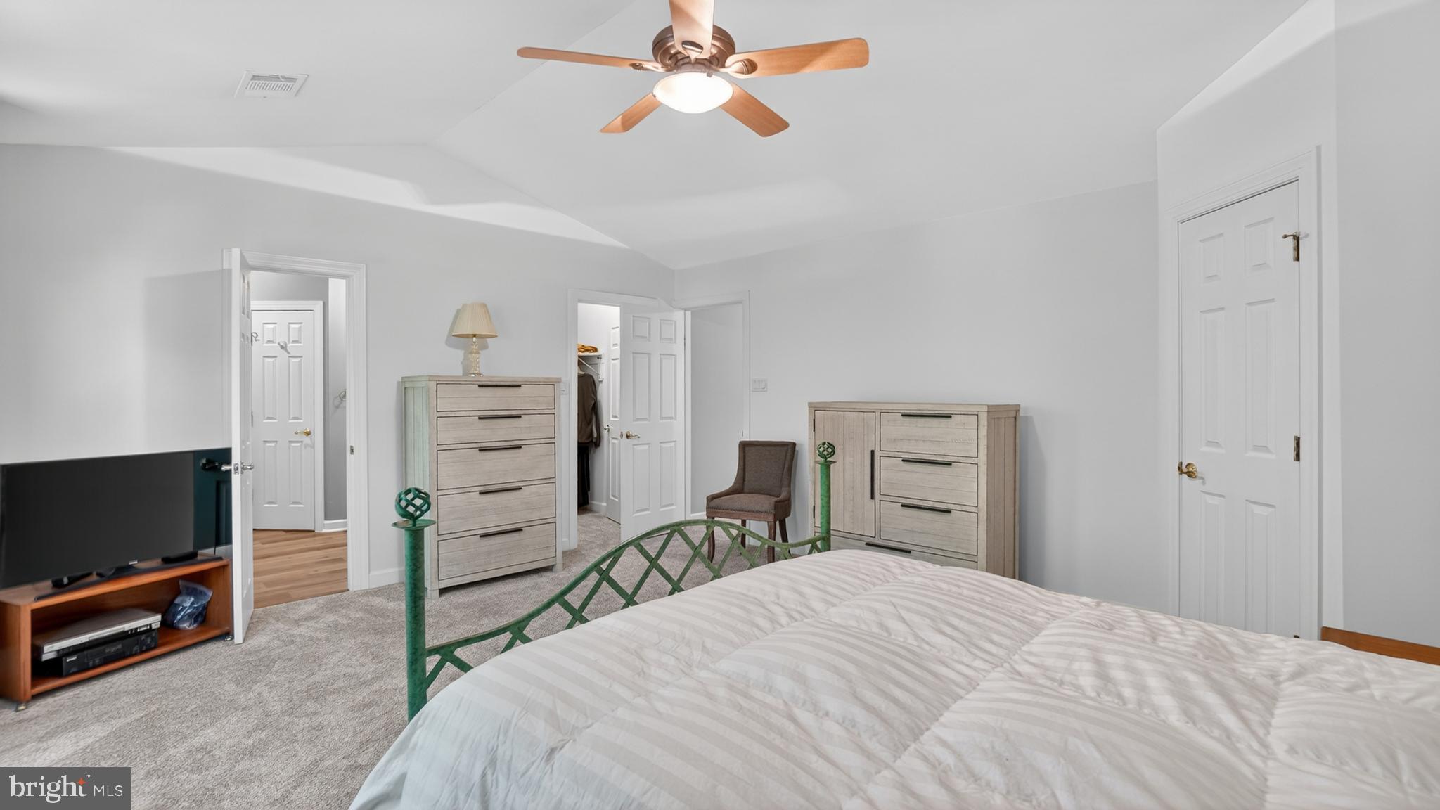 2812 Brite Court Crofton, MD 21114 - Photo 29 of 55 a bedroom with a bed and a flat screen tv