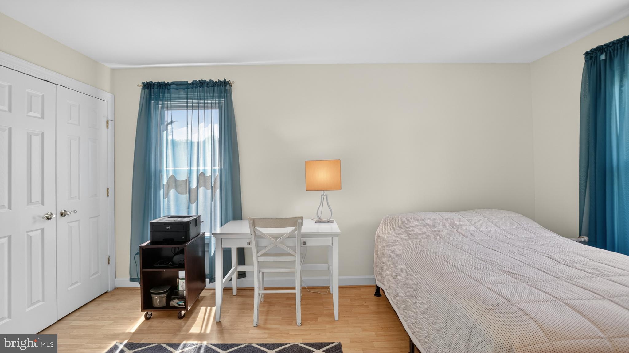 2812 Brite Court Crofton, MD 21114 - Photo 34 of 55 a bedroom with a bed and a chair