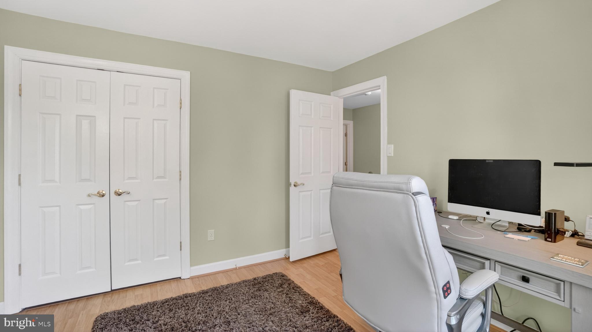 2812 Brite Court Crofton, MD 21114 - Photo 37 of 55 a view of a workspace with furniture and wooden floor