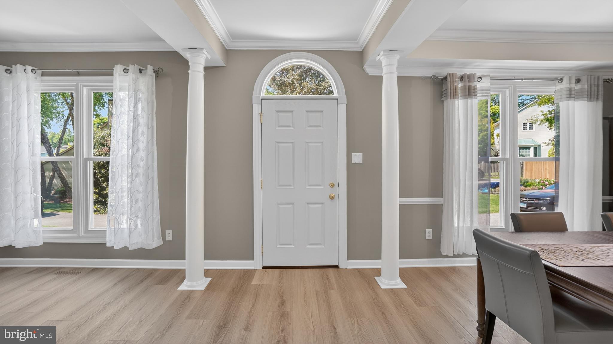 2812 Brite Court Crofton, MD 21114 - Photo 4 of 55 an empty room with window and wooden floor