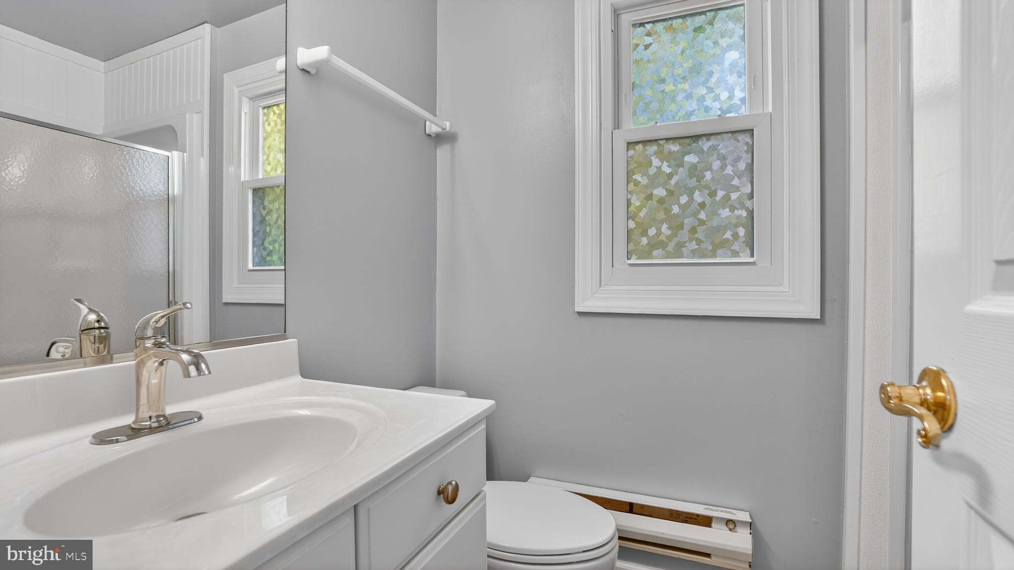 2812 Brite Court Crofton, MD 21114 - Photo 43 of 55 a bathroom with a sink a toilet and shower