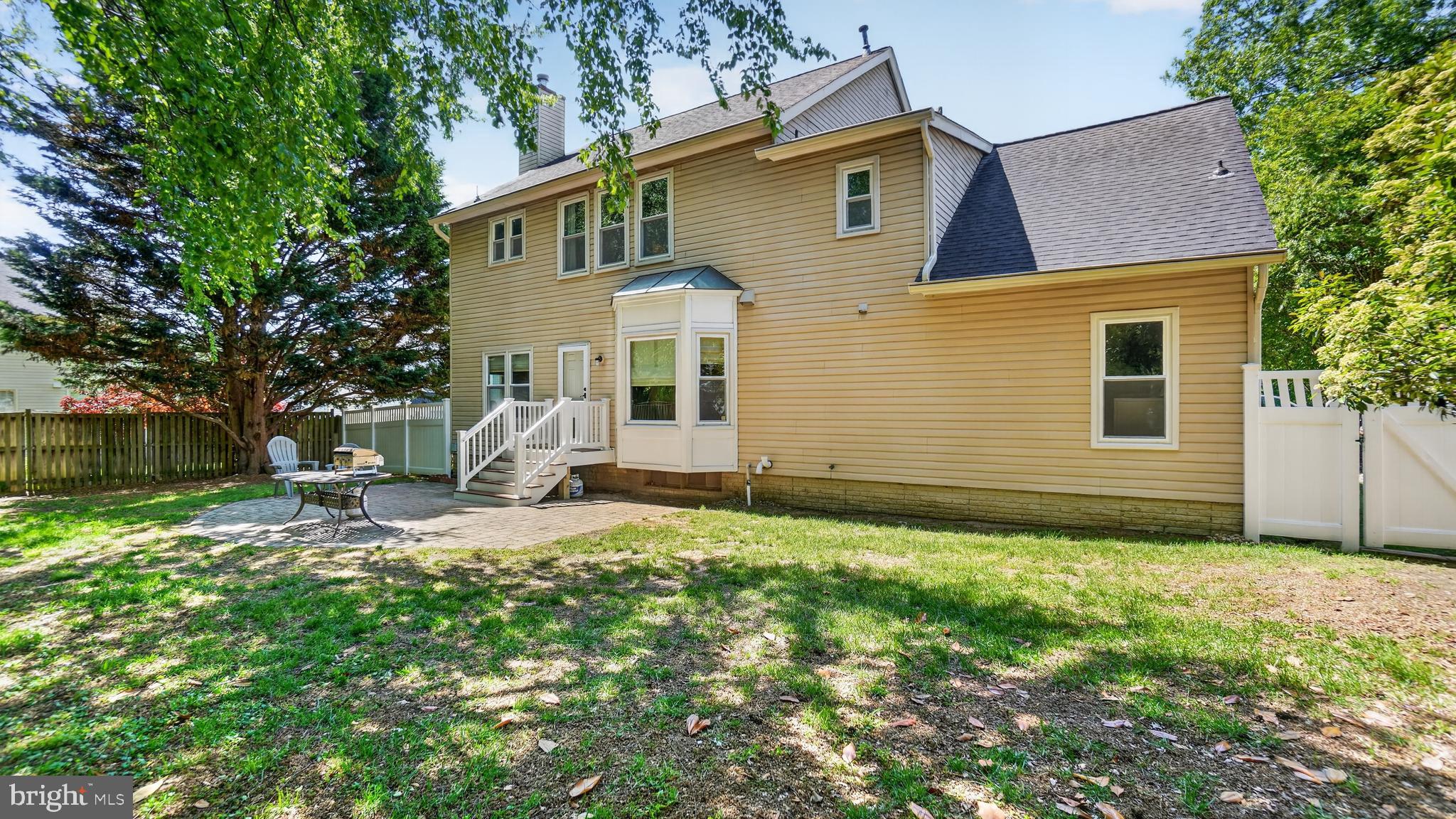2812 Brite Court Crofton, MD 21114 - Photo 52 of 55 a front view of a house with a yard