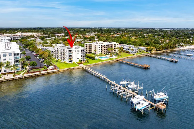 a terrace with outdoor seating and city view