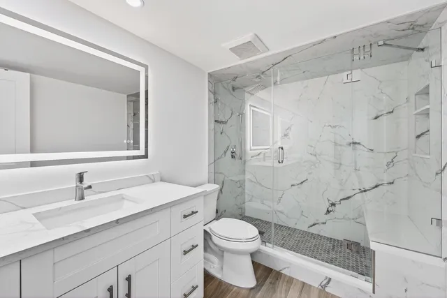 a view of balcony with wooden floor