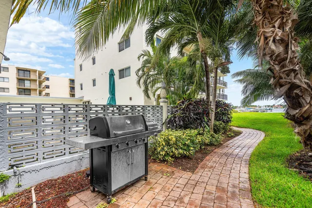 an aerial view of a house with outdoor space