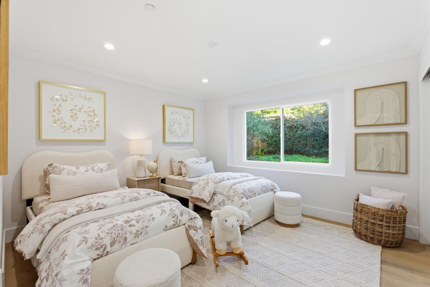 670 La Mesa Drive Portola Valley, CA 94028 - Photo 19 of 43 a bedroom with two beds and a window