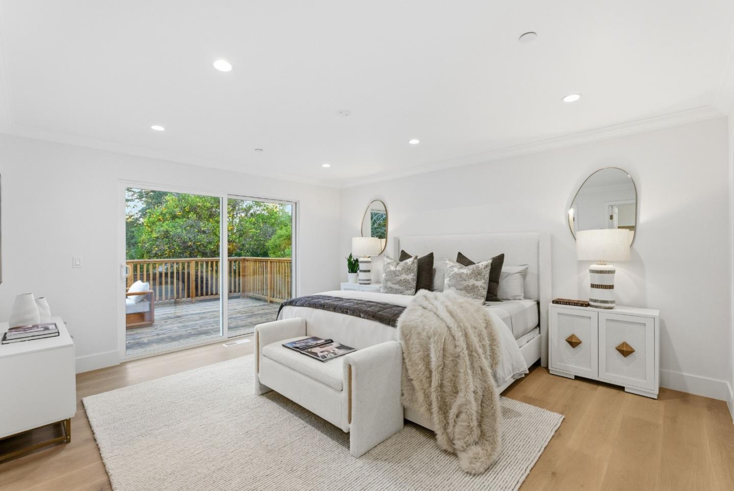 670 La Mesa Drive Portola Valley, CA 94028 - Photo 22 of 43 a bedroom with bed and a large window