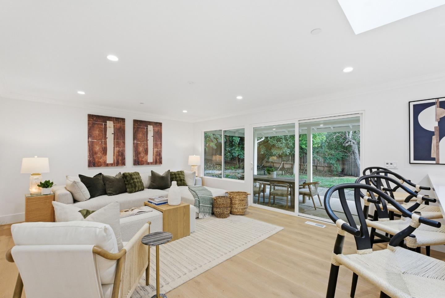 670 La Mesa Drive Portola Valley, CA 94028 - Photo 9 of 43 a living room with furniture and a large window