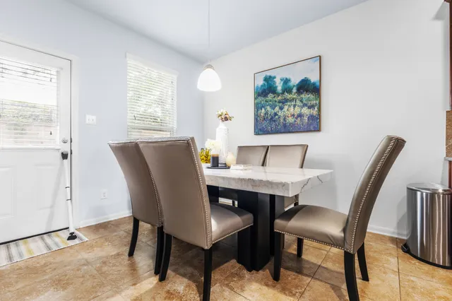 a view of a dining room with furniture