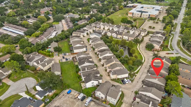an aerial view of residential house with outdoor space