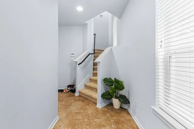a view of entryway with wooden floor