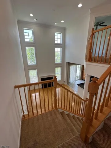 a view of an entryway with a staircase