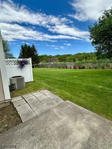 a view of a garden with an outdoor space