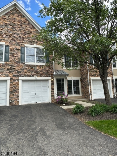 35 Magnolia Way, Unit 35 North Haledon, NJ 07508 - Photo 3 of 34 front view of a house with a tree