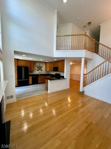 a view of kitchen and dining room with furniture