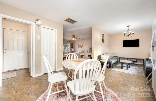 a view of a dining room with furniture