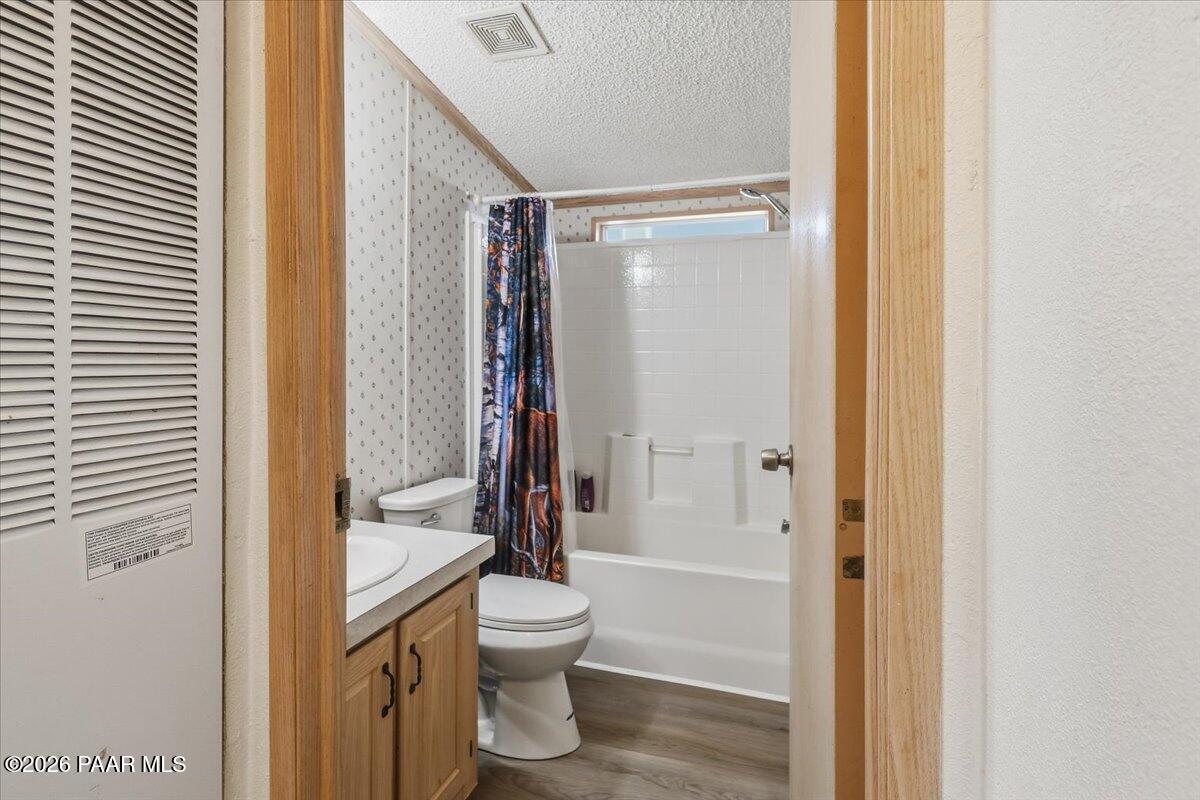 24725 North Patricia Road Paulden, AZ 86334 - Photo 17 of 30 a bathroom with a toilet and a shower