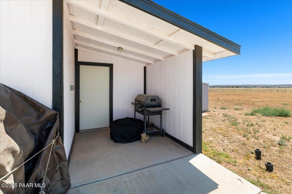 24725 North Patricia Road Paulden, AZ 86334 - Photo 18 of 30 a view of a livingroom with wooden floor and furniture