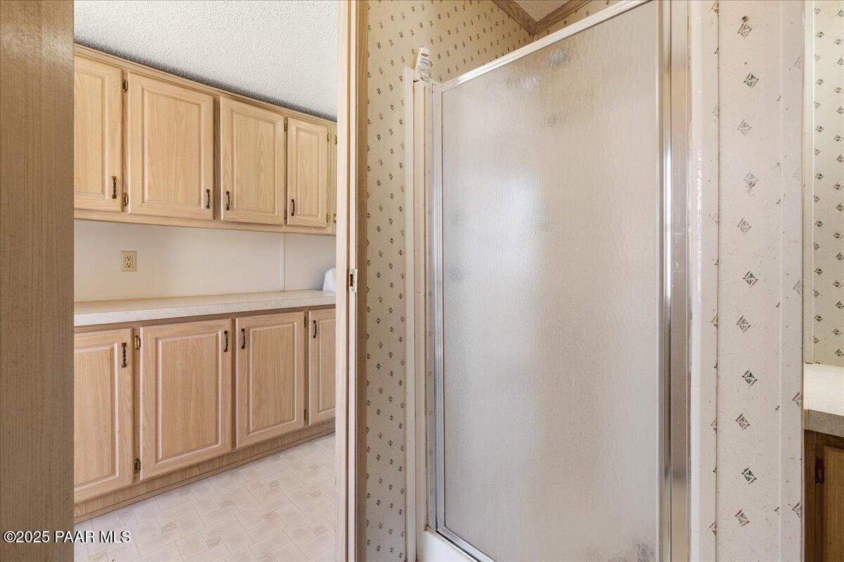 24725 North Patricia Road Paulden, AZ 86334 - Photo 23 of 36 a view of a closet with wooden floor