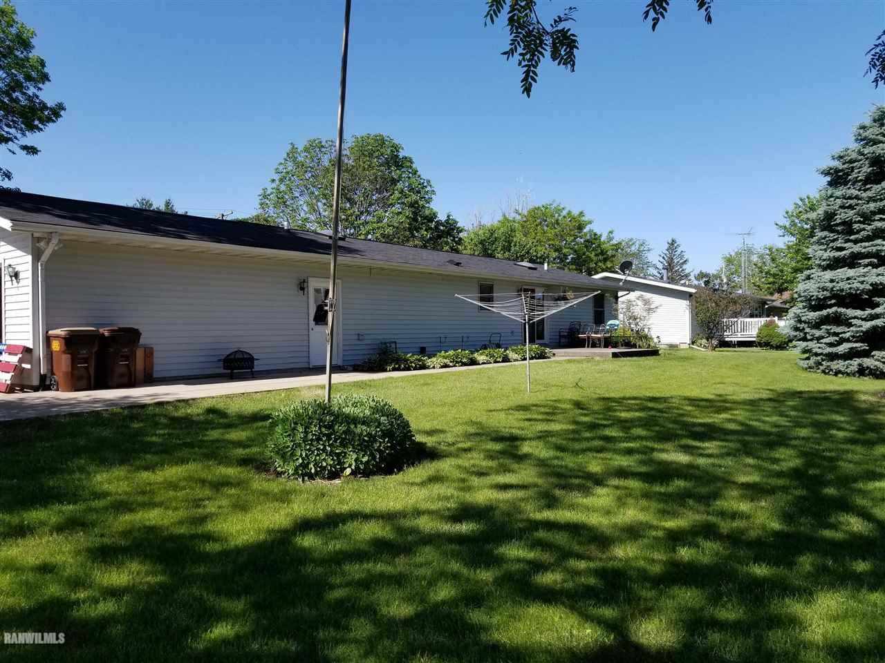 202 West Division Road Shannon, IL 61078 - Photo 13 of 14 a house view with a garden space