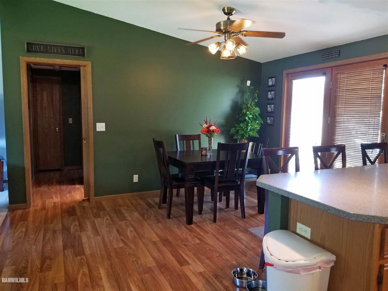 202 West Division Road Shannon, IL 61078 - Photo 5 of 14 a view of a dining room with furniture window and wooden floor