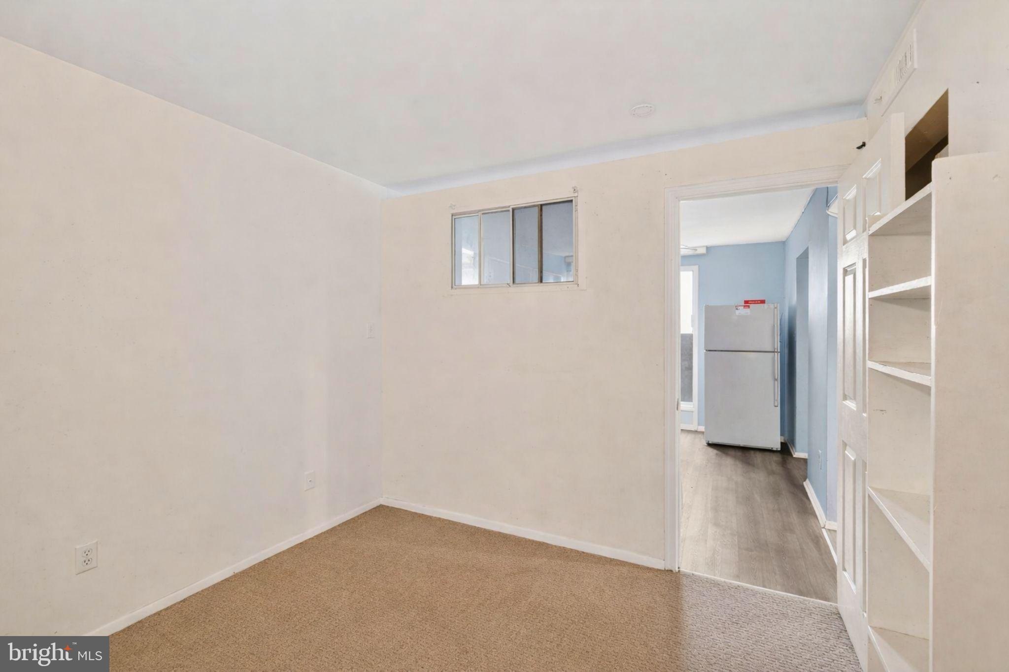 7957 Riggs Road, Unit 11 Hyattsville, MD 20783 - Photo 9 of 19 a view of an empty room