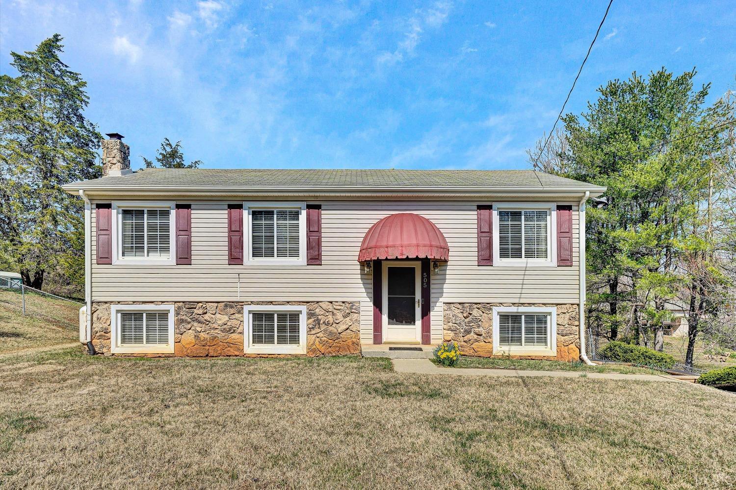front view of a house with a yard