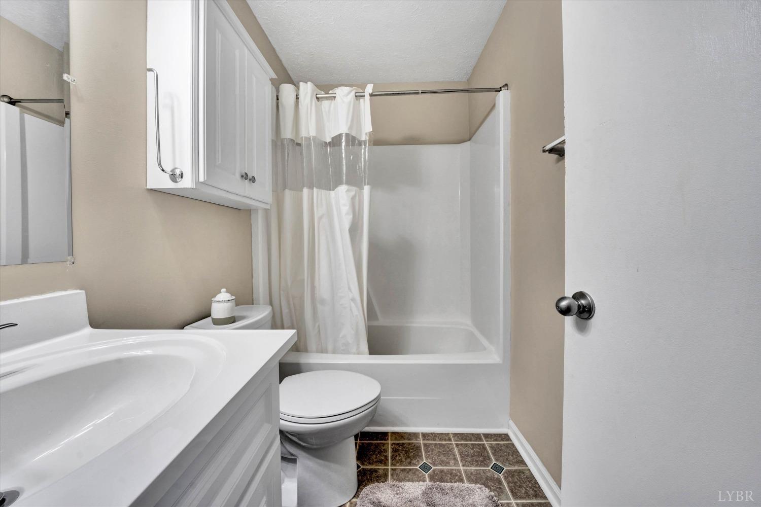 505 Sweeney Circle Forest, VA 24551 - Photo 14 of 29 a bathroom with a toilet and shower