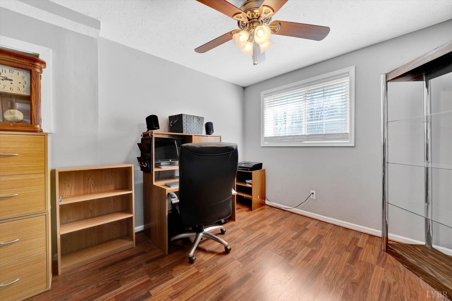 505 Sweeney Circle Forest, VA 24551 - Photo 21 of 29 a view of a workspace with furniture and a window
