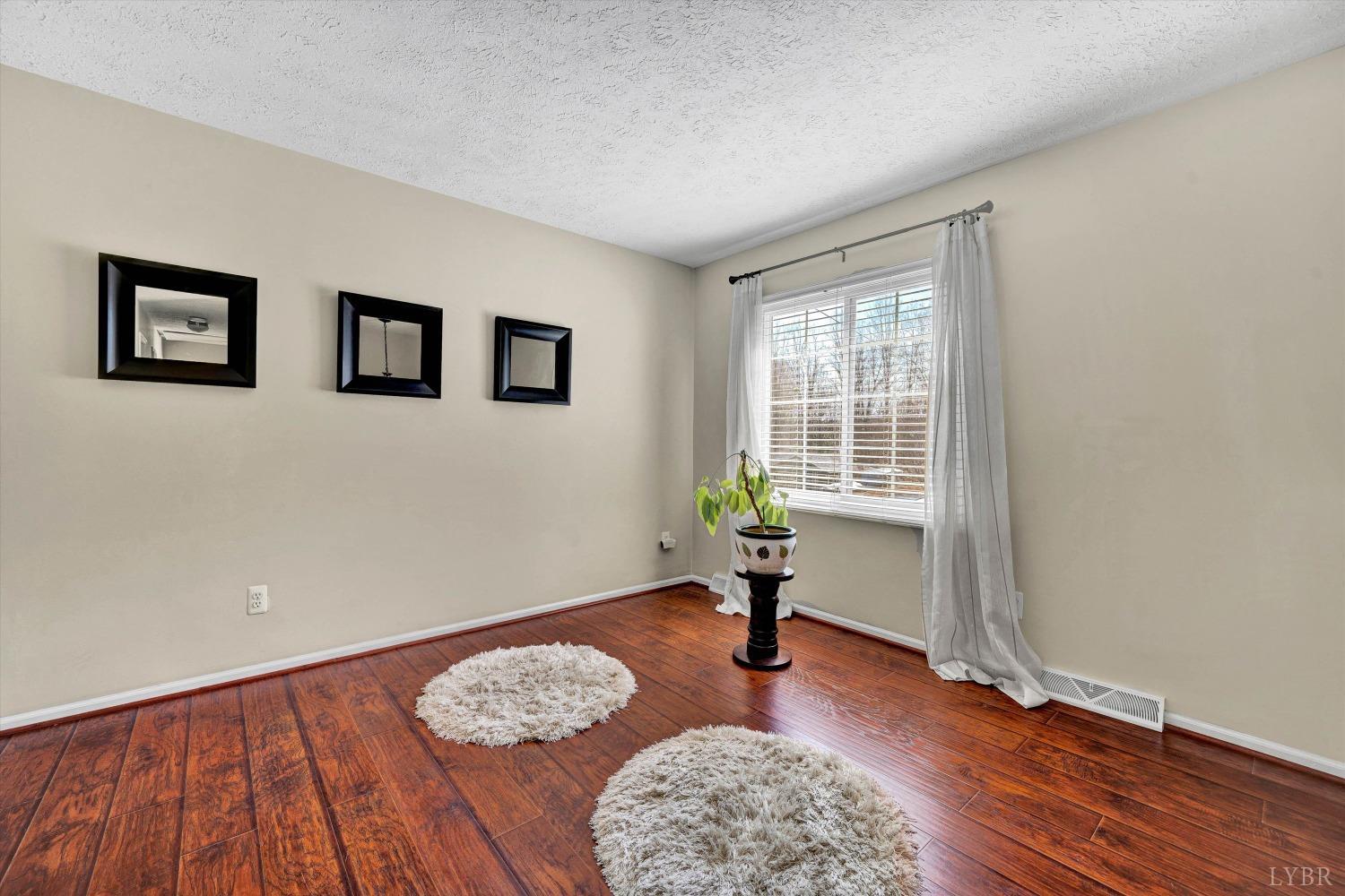 505 Sweeney Circle Forest, VA 24551 - Photo 6 of 29 a view of workspace room with wooden floor and window