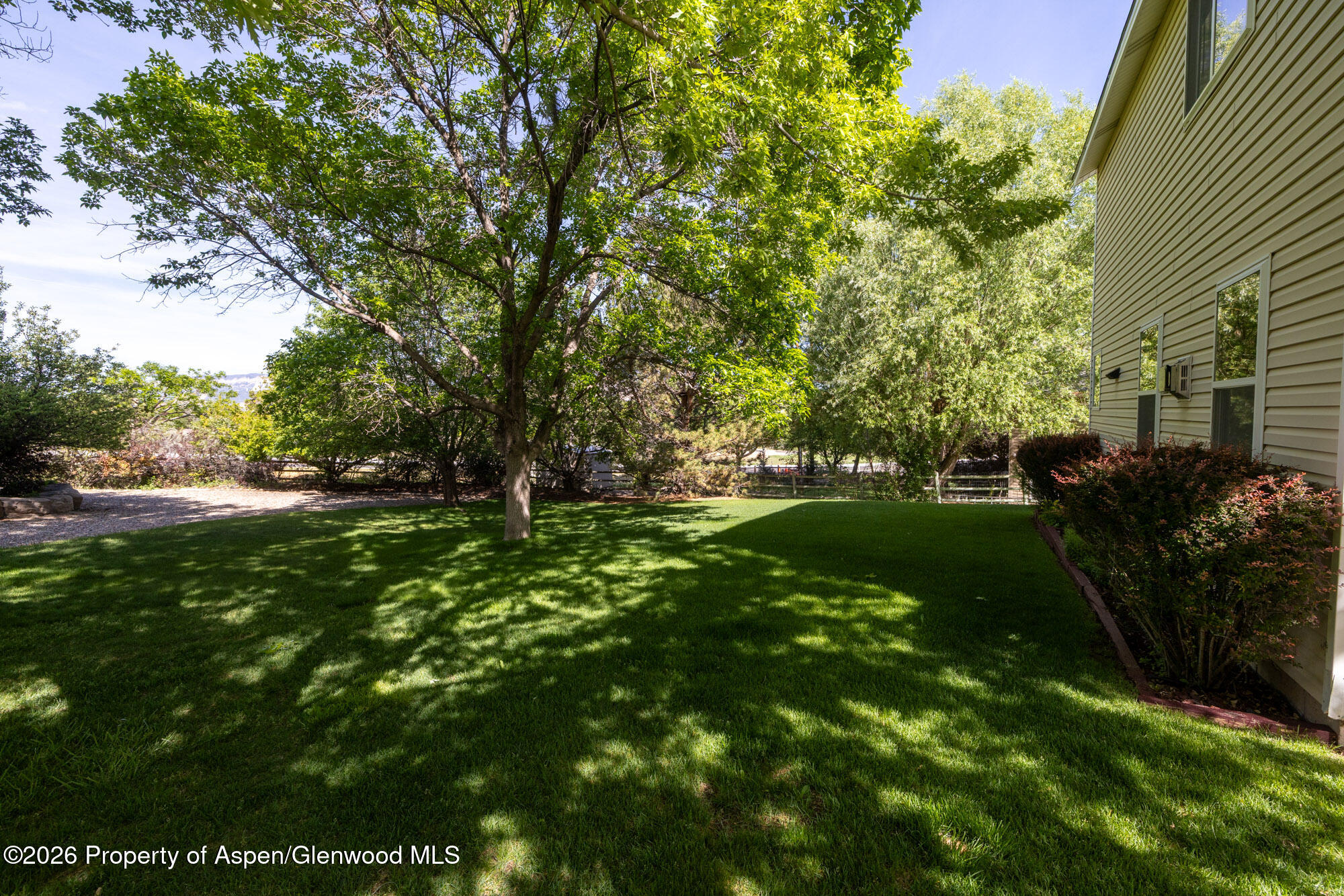 1335 Firethorn Drive Rifle, CO 81650 - Photo 26 of 30 a view of a garden