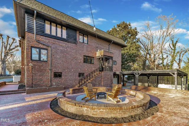 an aerial view of a house with swimming pool