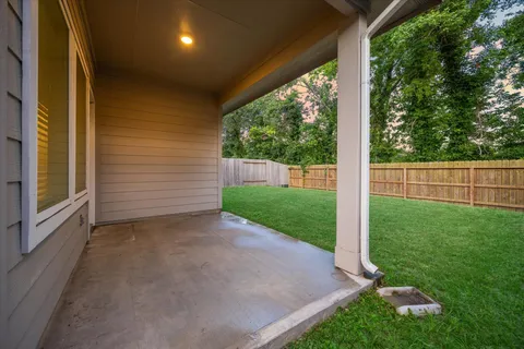 a view of a porch with a yard