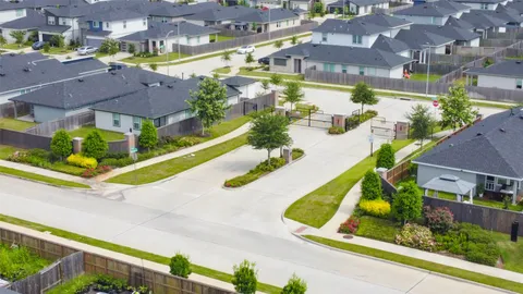 a view of swimming pool with a patio