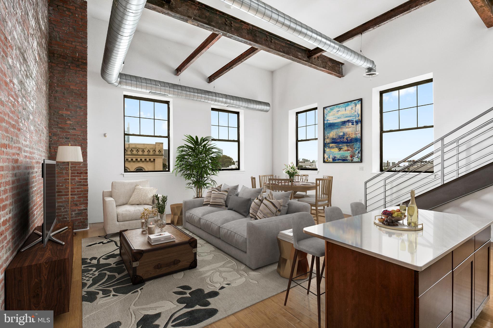 a living room with furniture a flat screen tv and a window