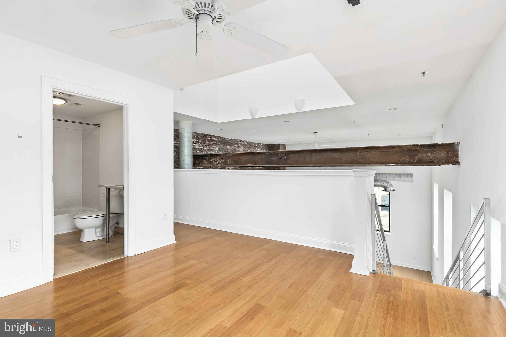 1637-39 Poplar Street, Unit S4 Philadelphia, PA 19130 - Photo 11 of 26 a view of an empty room and wooden floor