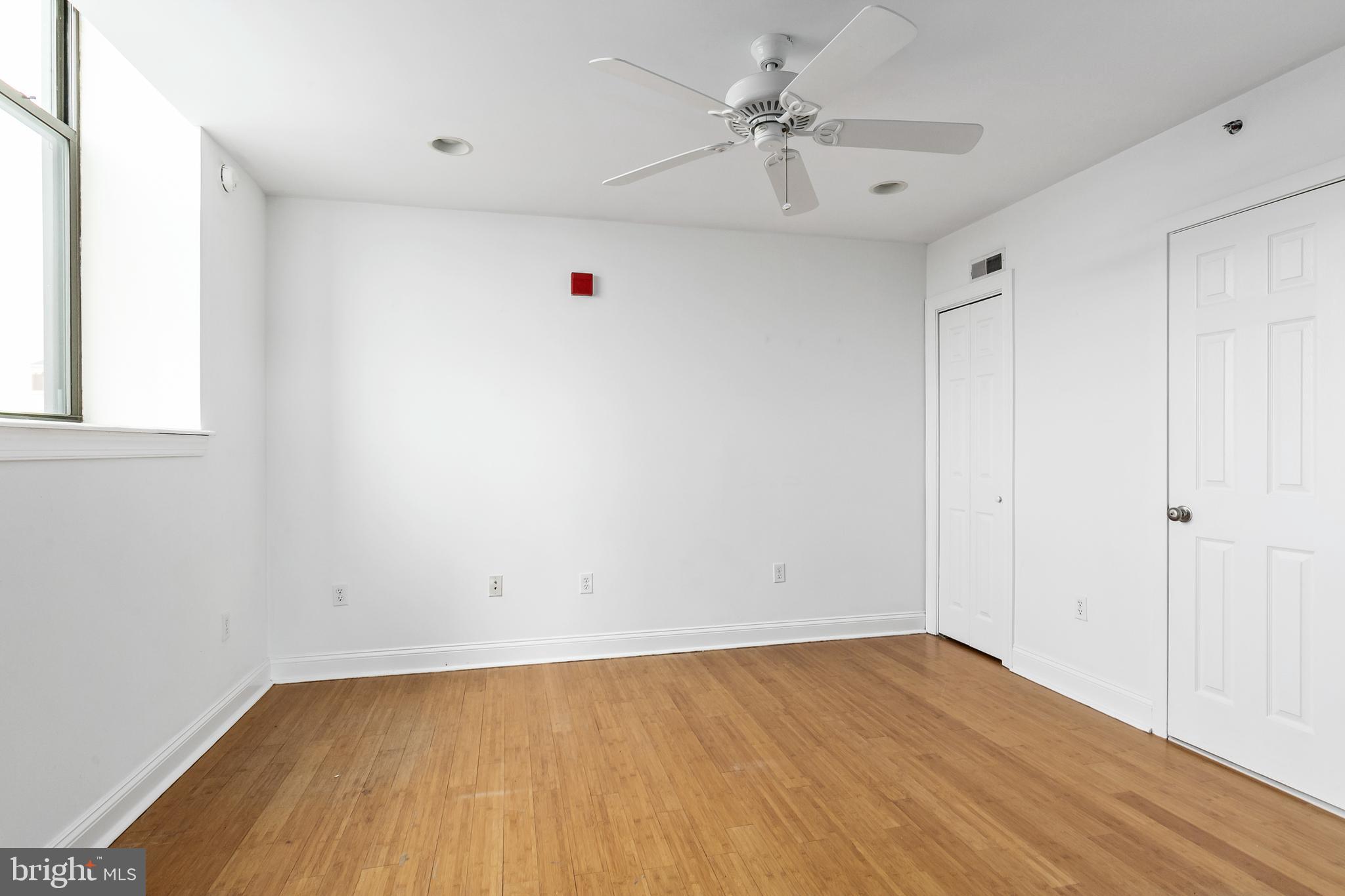 1637-39 Poplar Street, Unit S4 Philadelphia, PA 19130 - Photo 19 of 26 wooden floor in an empty room