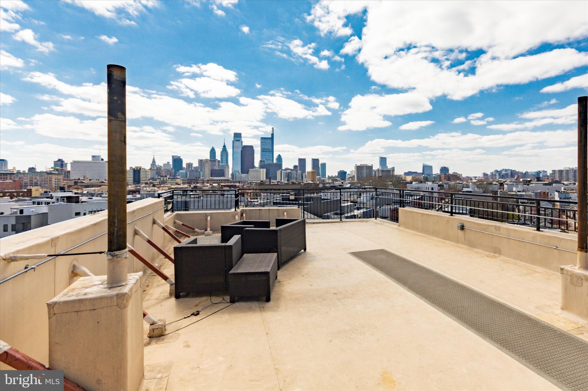 1637-39 Poplar Street, Unit S4 Philadelphia, PA 19130 - Photo 25 of 26 a view of a terrace with seating space