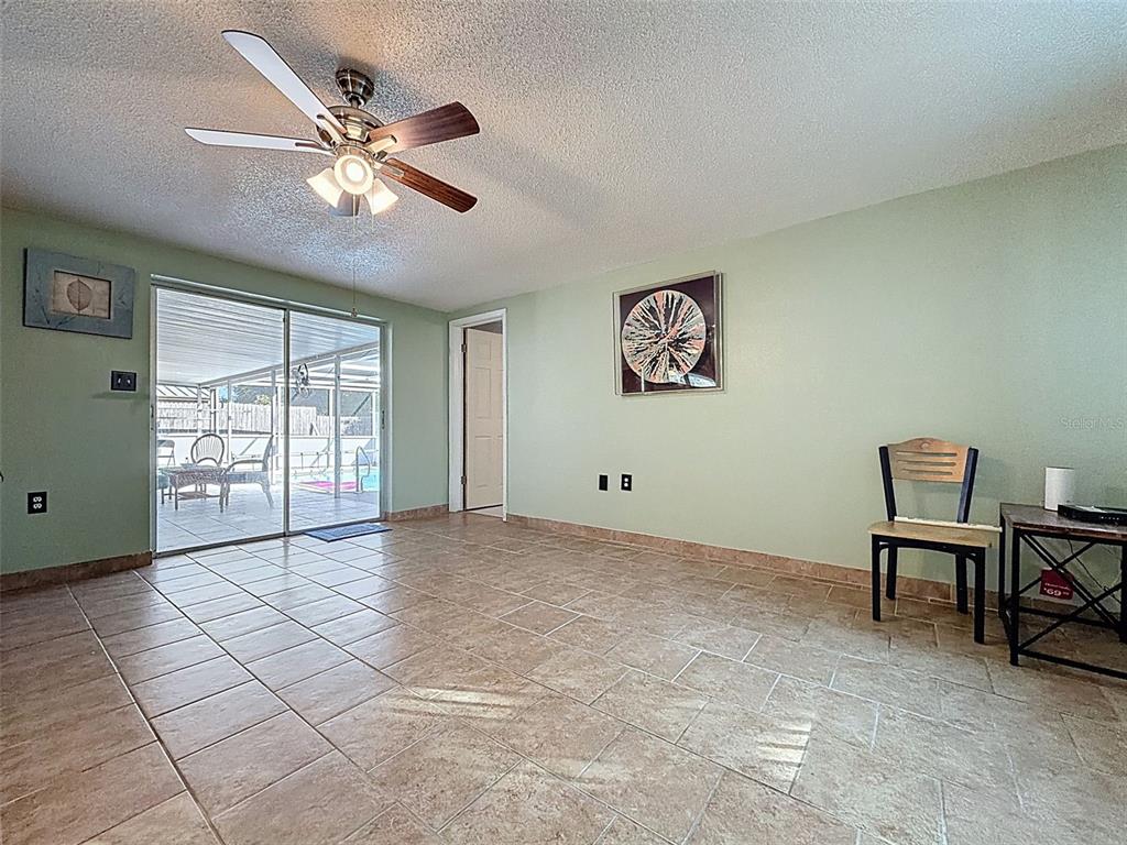 9610 Rainbow Lane Port Richey, FL 34668 - Photo 22 of 34 a view of workspace with window and furniture