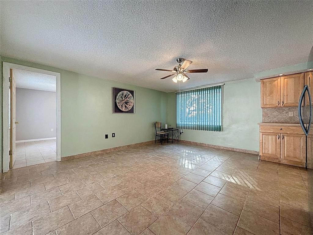 9610 Rainbow Lane Port Richey, FL 34668 - Photo 24 of 34 a view of an empty room with a window