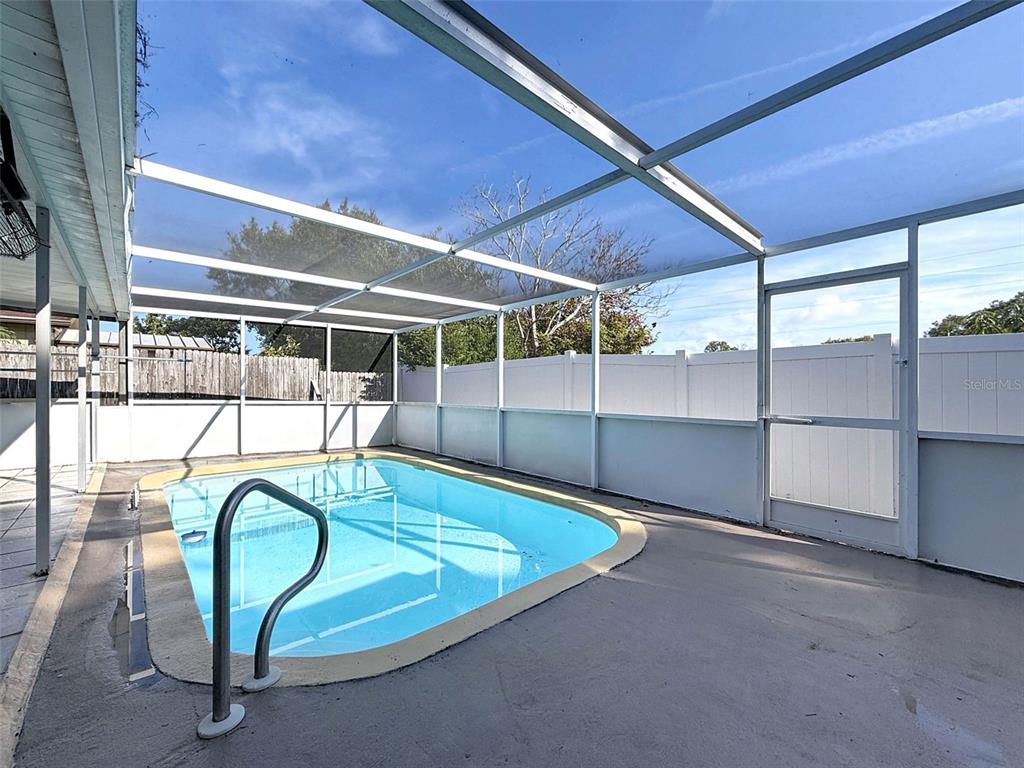 9610 Rainbow Lane Port Richey, FL 34668 - Photo 31 of 34 a view of a indoor swimming pool