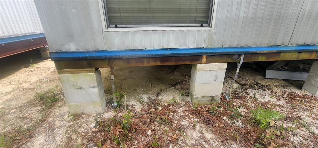 2228 Turkey Oak Road Perry, FL 32348 - Photo 22 of 76 a room with a table and a window