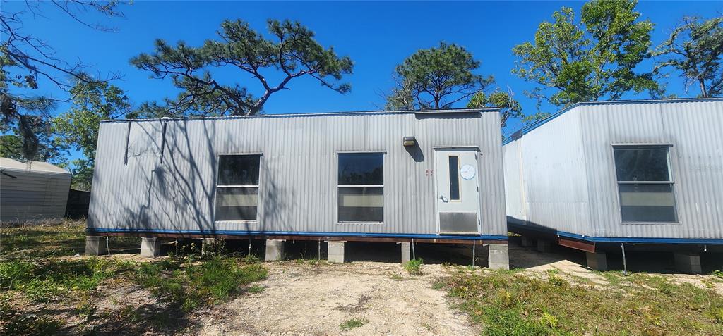 2228 Turkey Oak Road Perry, FL 32348 - Photo 3 of 76 a front view of a house with a yard