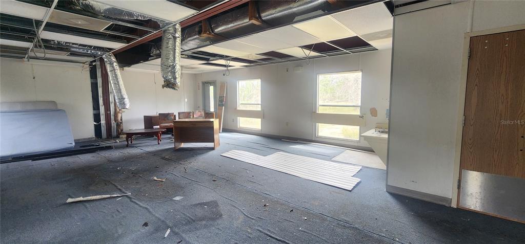 2228 Turkey Oak Road Perry, FL 32348 - Photo 39 of 76 a living room with furniture and a window
