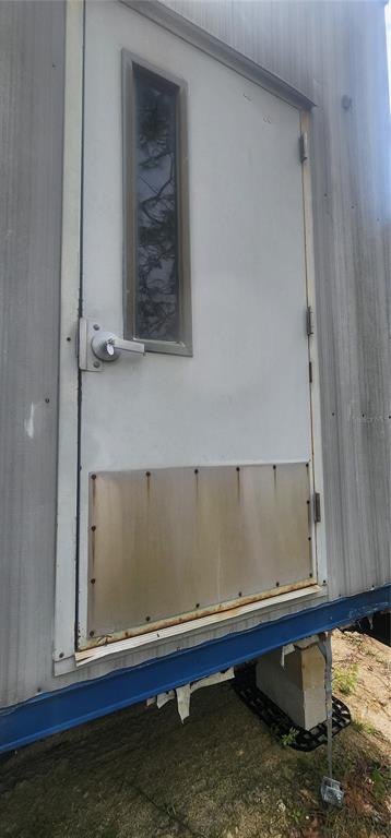 2228 Turkey Oak Road Perry, FL 32348 - Photo 42 of 76 a room with a window and a wooden floor