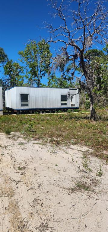 2228 Turkey Oak Road Perry, FL 32348 - Photo 52 of 76 a backyard of a house
