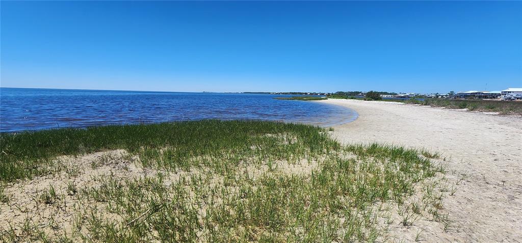 2228 Turkey Oak Road Perry, FL 32348 - Photo 68 of 76 a view of a lake from a yard