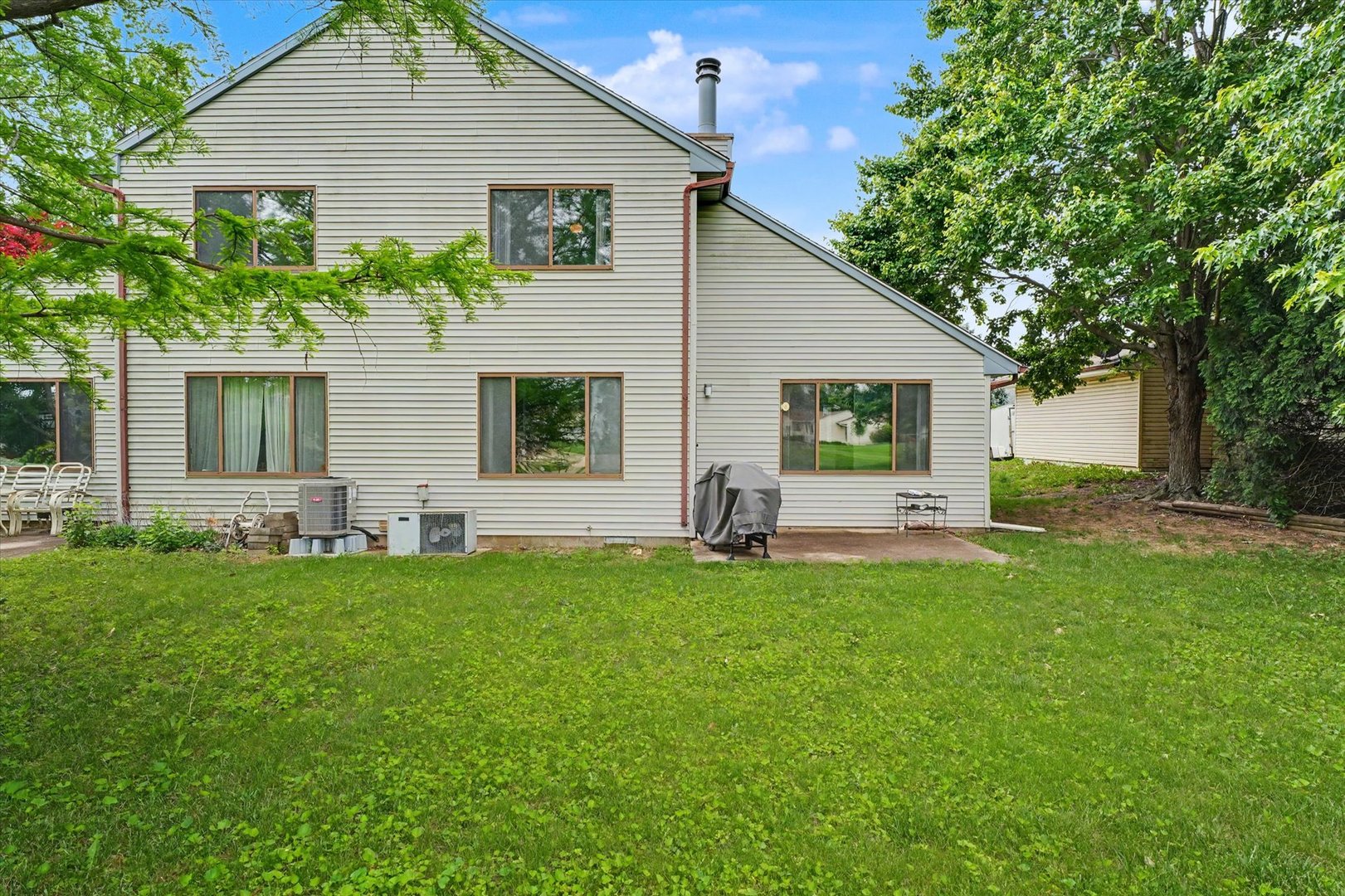 711 Higgins Road Champaign, IL 61822 - Photo 23 of 23 a front view of house with yard and green space